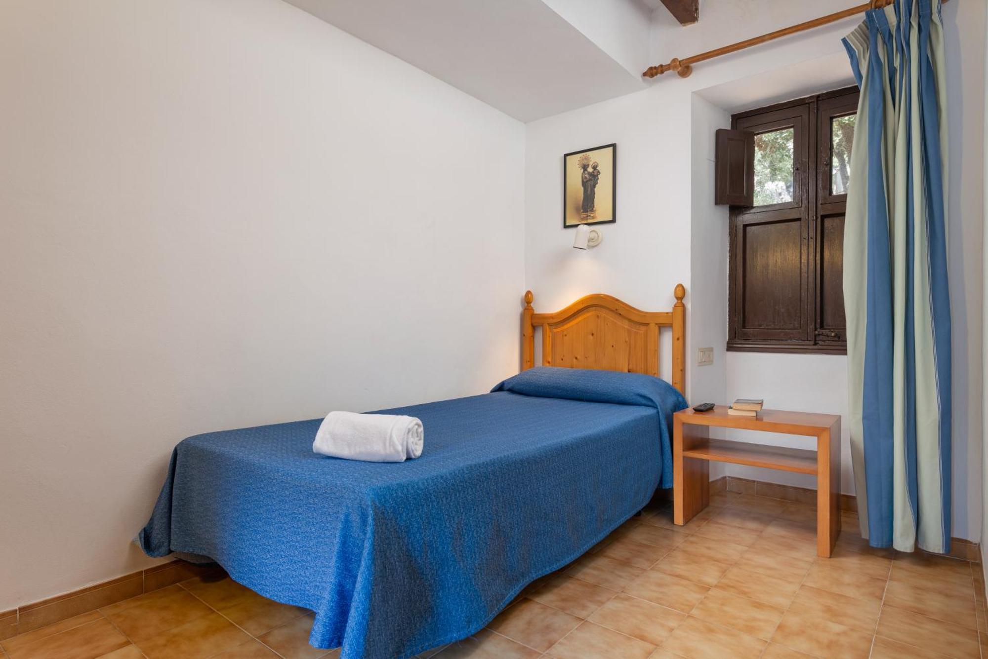 Hotel Santuari De Lluc Habitación foto